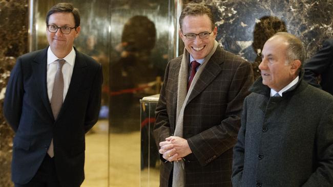 BHP Billiton’s Geoff Healy, Andrew Mackenzie and Jac Nasser wait to meet Donald Trump in New York this week. Pic: AP