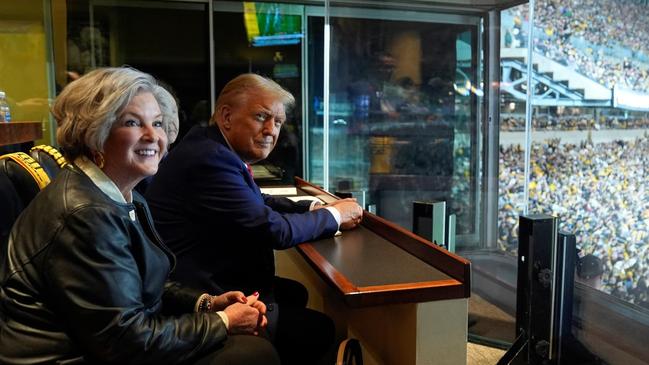 Susie Wiles and Donald Trump at a football game in Pittsburgh. Picture: Press pool.