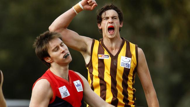 A young Damian Garner celebrates a goal in Rowville’s 2012 premiership win.