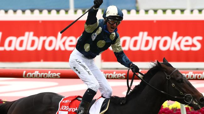 Glen Boss salutes after he wins the 2020 Cox Plate. Picture: Getty Images