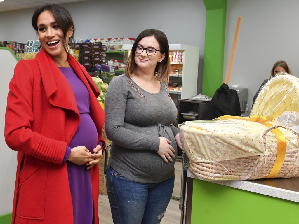 Meghan, pictured above in January presenting a baby basket to expectant mother, Angela Midgley, has reportedly been practising breathing techniques with Harry. Picture: Anthony Devlin.