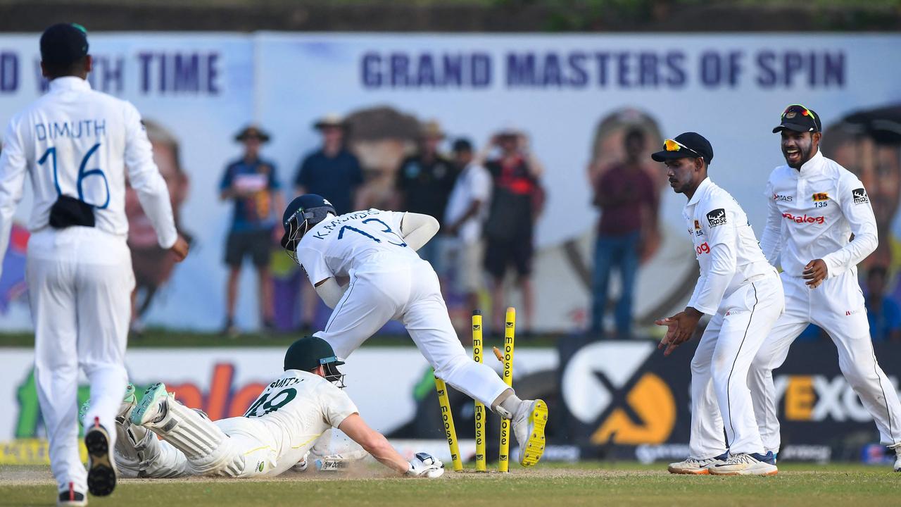 Australia’s Steve Smith is run out Sri Lanka’s Kusal Mendis. Picture: AFP