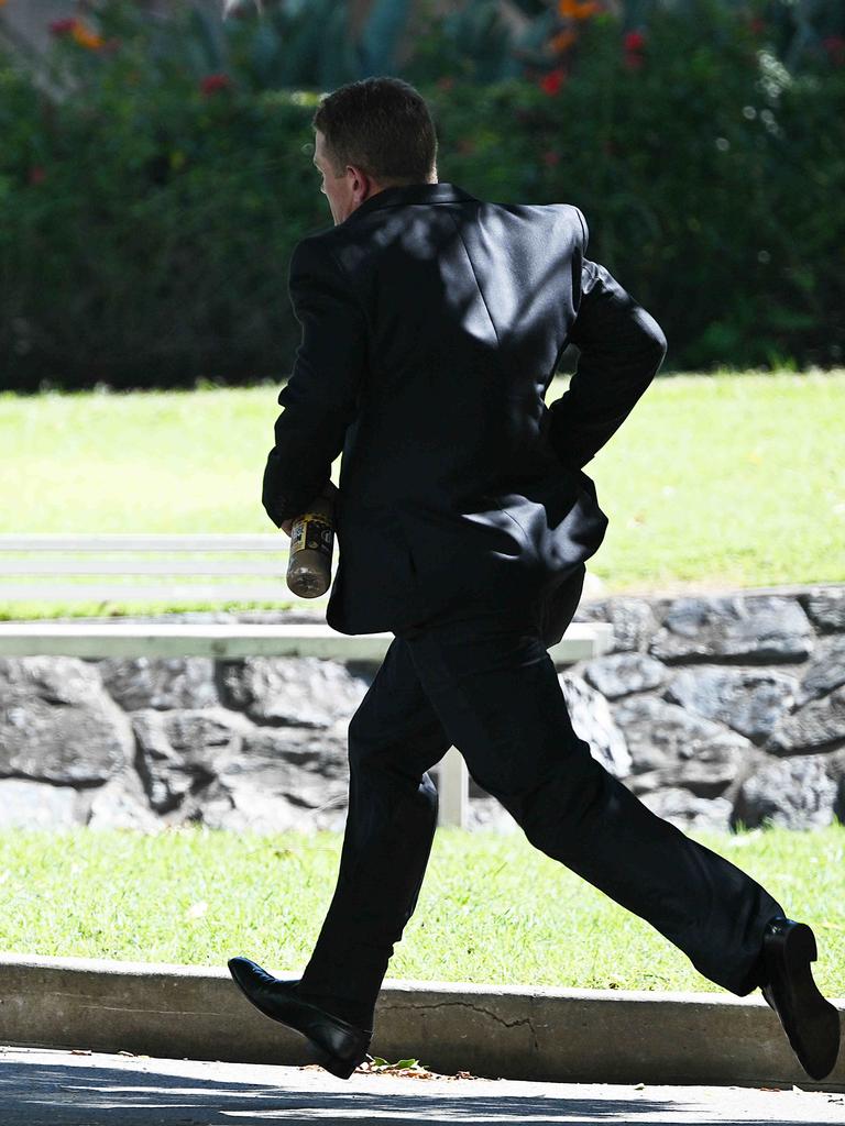 Campbell sprints from court after his guilty plea. Pic: Lyndon Mechielsen/Courier Mail