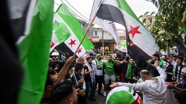 The Syrian community in Lakemba celebrate the overthrow the Bashar al-Assad government. Other people in nearby Chullora, not pictured, allegedly chanted an anti-Semitic slogan during celebrations. Picture: Jeremy Piper