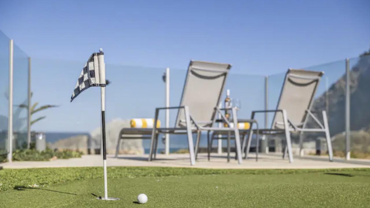 In a rare feature, a mini golf course provides another entertainment option for the kids at the Sapphire Beach house.