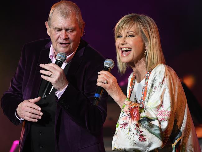 Two strong hearts … John Farnham and Olivia Newton-John. Picture: AAP