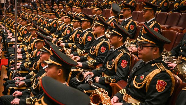 Members of the People's Liberation Army band in the Great Hall of the People on Sunday. Picture: AFP