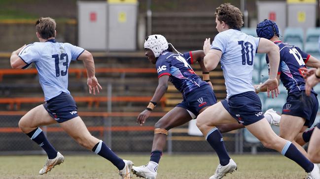 Waratahs' Liam Grover on the burst for a try against the Rebels.