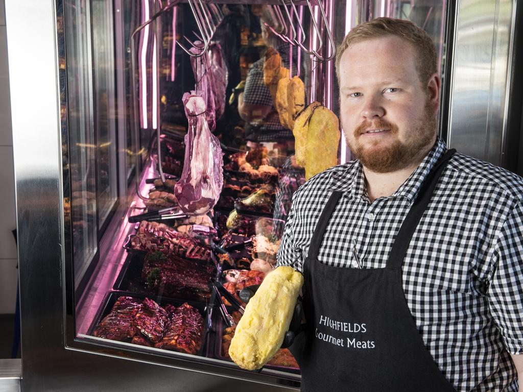 Highfields Gourmet Meats owner Christian Nicholls holds an aged butter, barley-fed rib fillet. Picture: Nev Madsen.