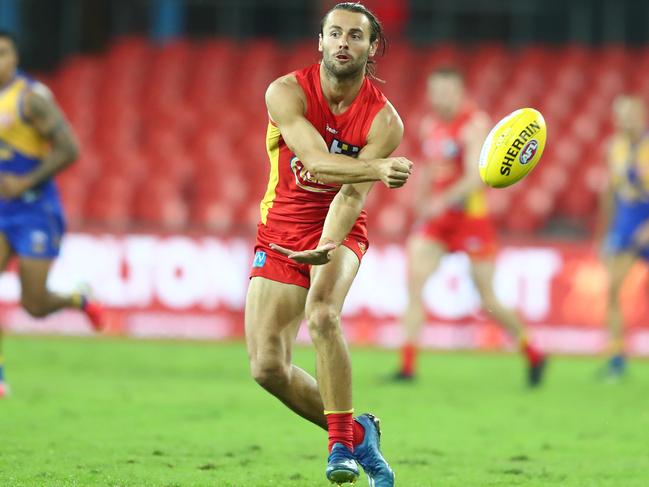 Lachie Weller dominated the midfield for the Suns against the Eagles. Picture: CHRIS HYDE/GETTY