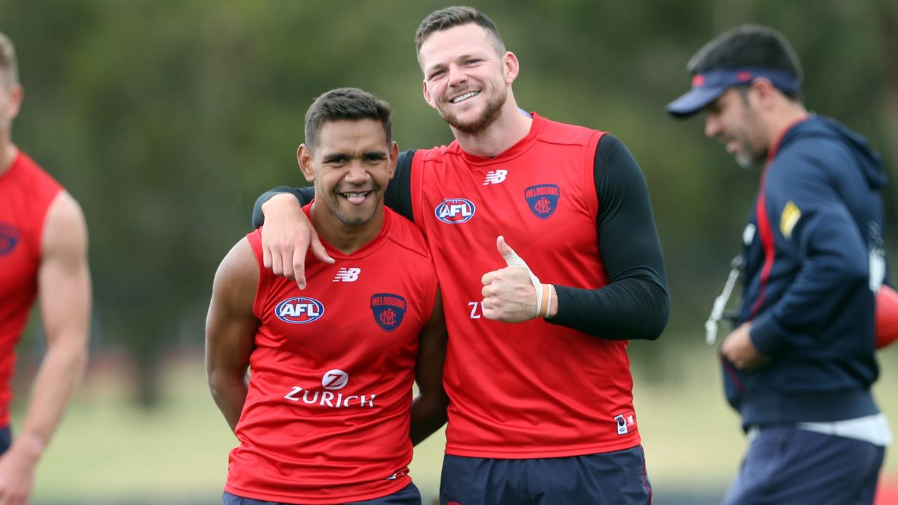 Neville Jetta and Steven May are all smiles at Melbourne training. Picture: David Crosling