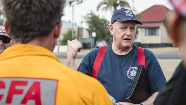 CFA strike team leader Tony McMeel of Freshwater Creek brigade talks to the team as CFA crews from Victoria arrive in Warwick to help support Queensland fireys, Thursday, November 2, 2023. Picture: Kevin Farmer