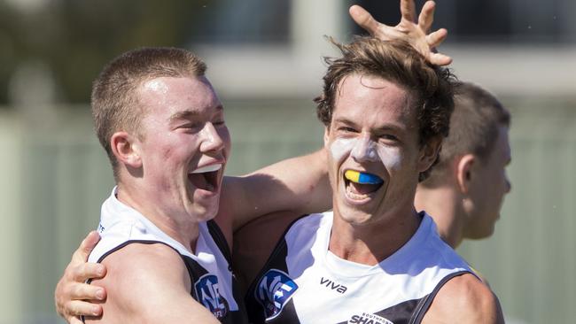 Kai Sheers (left) and Tom Wilkinson celebrate during Southport Sharks win over Canberra Demons at Fankhauser Reserve on Saturday, August 4, 2018. Picture credit: TJ Yelds, NEAFL.