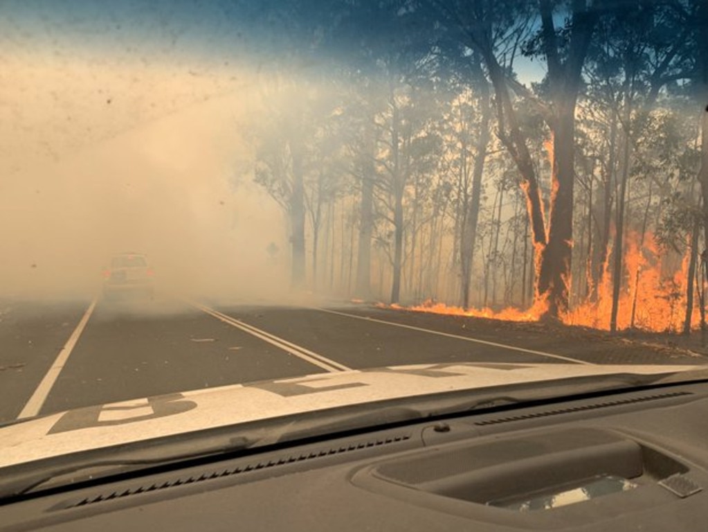 Fires burning on the side of the road at the Sussex Inlet turn-off near Jervis Bay.