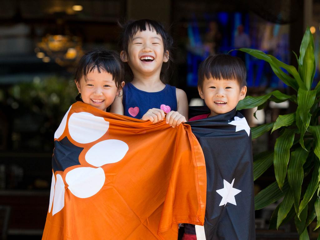 Liz Liu, 4 , Sophia Shen, 6, and Nicolas Shen, 3, at the Darwin Waterfront. Picture: Glenn Campbell