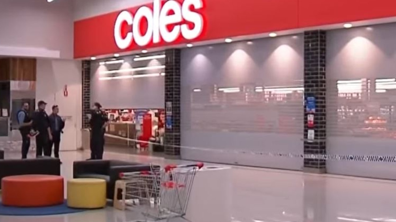 Police outside the Coles supermarket a Yamanto Central, after the stabbing of a staff member. Picture: 7News Brisbane