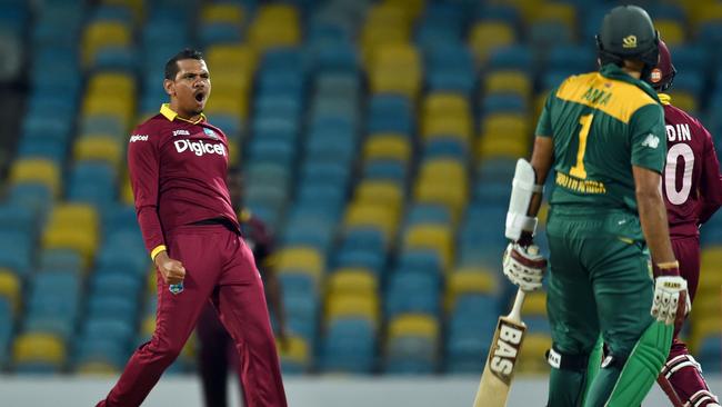 West Indies spinner Sunil Narine (L) celebrates the wicket of Sunil Narine.