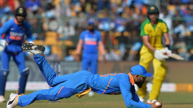 Virat Kohli takes a great catch to dismiss Labuschagne. Picture: Manjunath Kiran/AFP