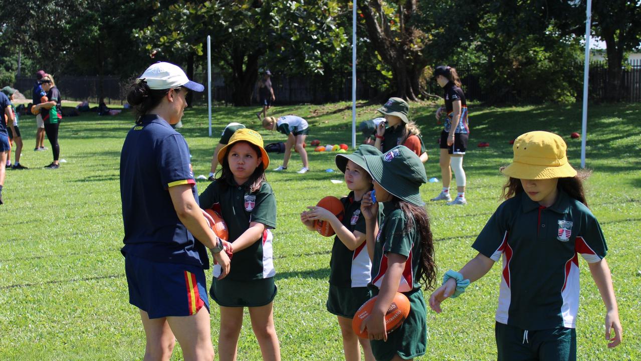 Mega Gallery: Adelaide Crows AFLW stars mix it with Whitfield State School  | The Cairns Post