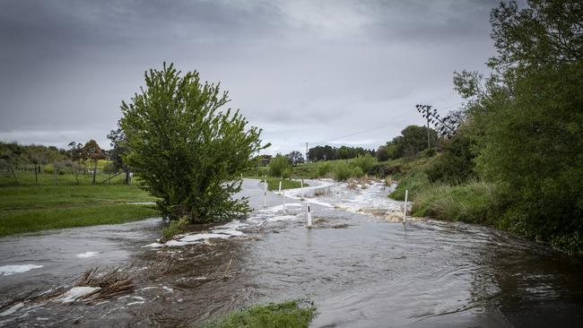 Sorell Rivulet near Pioneer Park overflowing due to the high amount of rainfall. Picture: LUKE BOWDEN