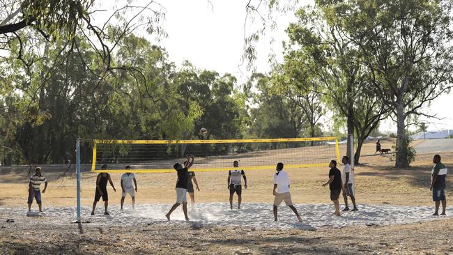 At a local park each week, the cultural mix is on show during a regular game of beach volleyball. Picture: Mark Cranitch.