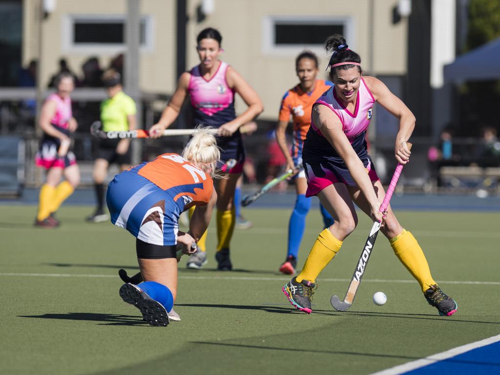 Samantha Richards (right) of Toowoomba 2 against Maryborough 1.