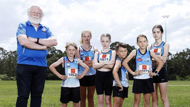 President of Rouse Hill Rams Little Athletics Bob Gribbin with kids (L-R) Zane Cowper 9, Flynn Cowper 12, Ella Caines 10, Oliver White 8, Evelyn White 10, and Lily Caines 12. Picture: Tim Hunter.