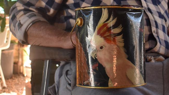 The lucky tin. Mr O’Brien has since had the winning tin painted with some of his favourite Australian birds.