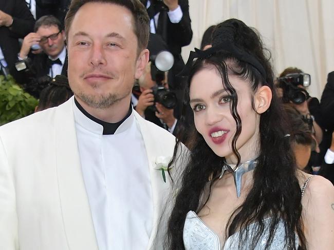 NEW YORK, NY - MAY 07:  Elon Musk and Grimes attend the Heavenly Bodies: Fashion & The Catholic Imagination Costume Institute Gala at The Metropolitan Museum of Art on May 7, 2018 in New York City.  (Photo by Neilson Barnard/Getty Images)