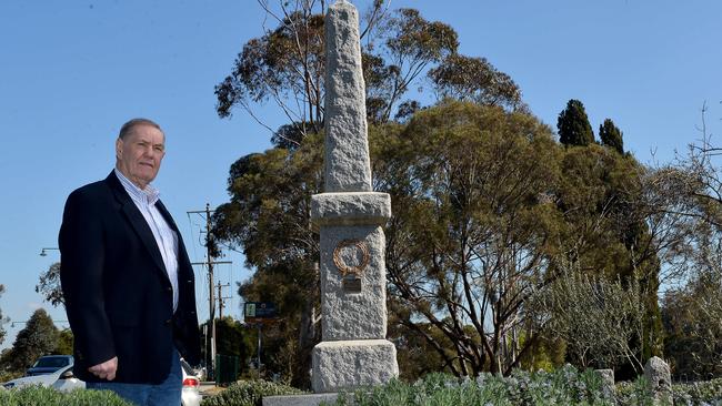 The Eltham Monty RSL wants to extend the Eltham cenotaph in time for the 2015 Anzac Day dawn service but some local community groups aren't happy with its plans. Bill McKenna, president of the Eltham Monty RSL with the current war memorial. Picture : Adam Elwood