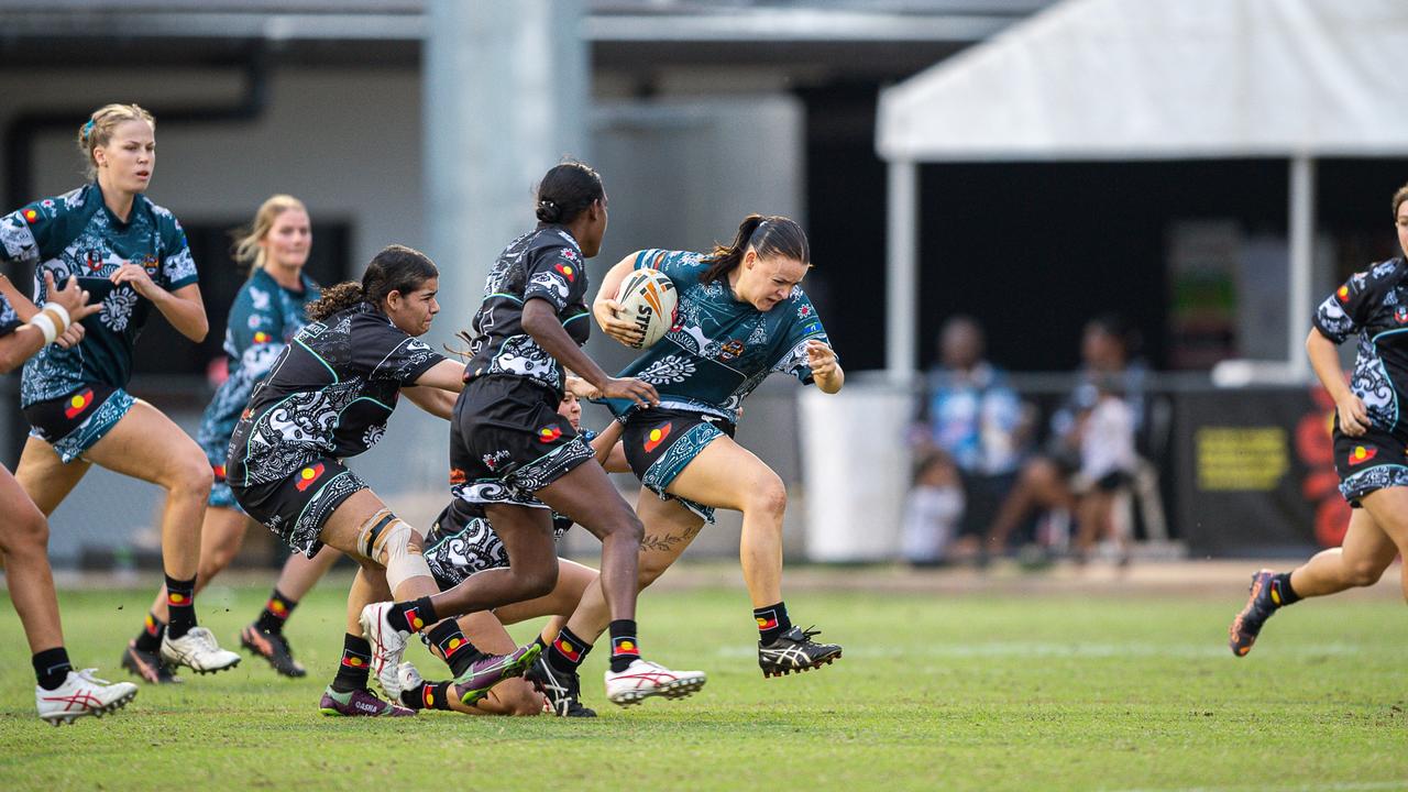 Emma Forsyth of the Territory All Stars tries to run through a tackle in the 2023 Deadly Cup Carnival. Picture: Pema Tamang Pakhrin