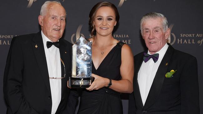 The Don Award winner Ash Barty poses with fellow inductees Neale Fraser (left) and Ken Rosewall