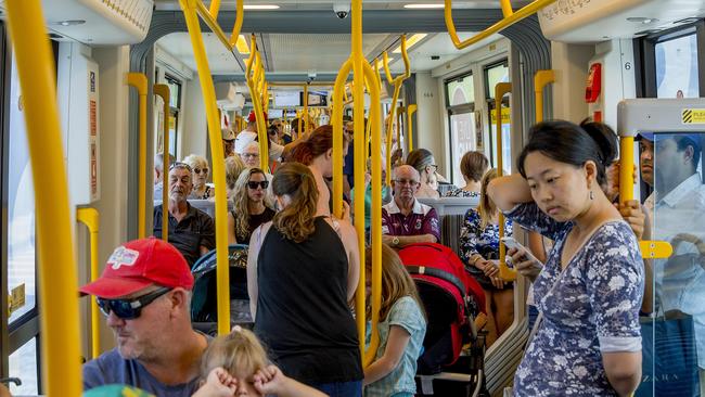 Passengers riding the light rail to the Helensvale Station. Picture: Jerad Williams