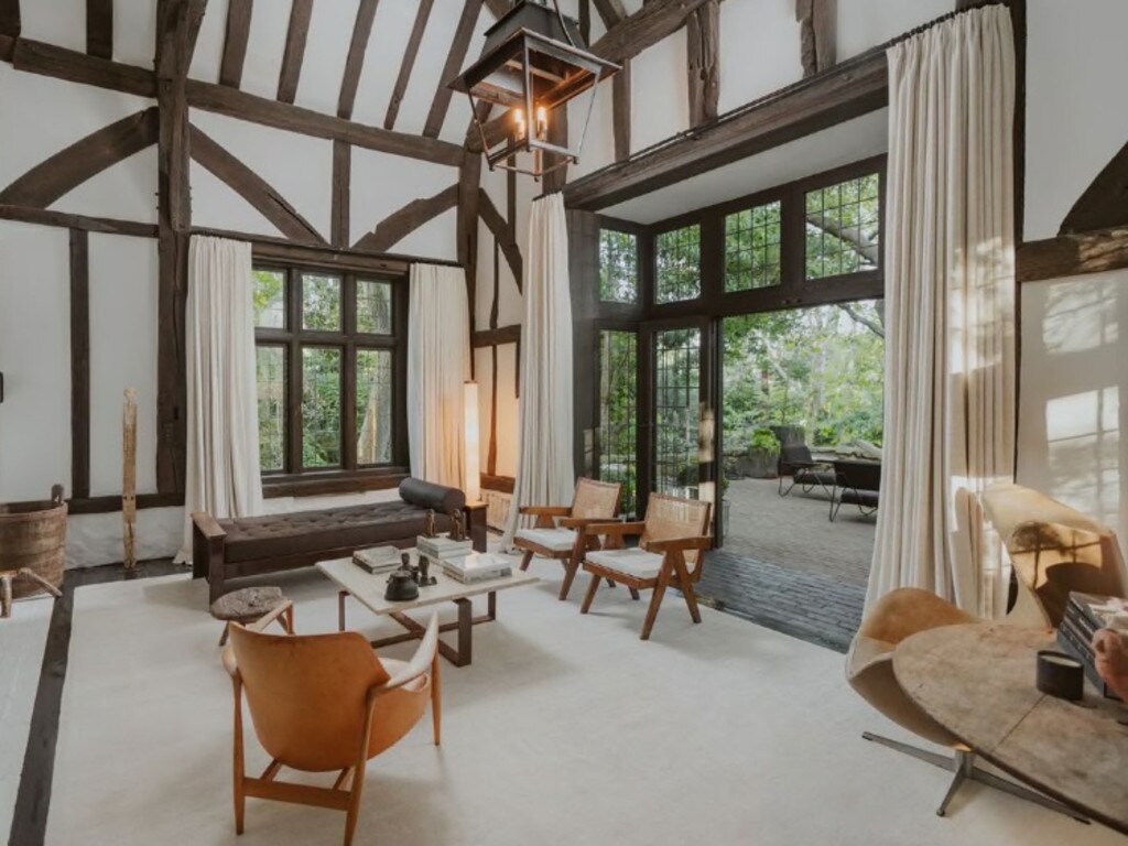 The home features wooden beams and casement windows. Picture: Mansion Global