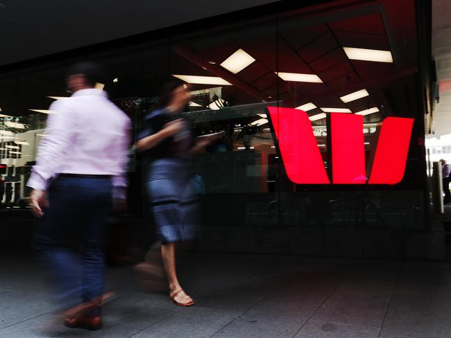 SYDNEY, AUSTRALIA - NOVEMBER 26: Pedestrians walk past a Westpac bank on November 26, 2019 in Sydney, Australia. Westpac has announced that chief executive Brian Hartzer will step down and chairman Lindsay Maxsted will leave the board early following the launch of an investigation by Australia's financial intelligence agency - AUSTRAC - over a money laundering and child exploitation scandal. AUSTRAC alleges the bank breached anti-money laundering laws 23 million times, including failing to adequately vet thousands of payments potentially linked to child exploitation. (Photo by Mark Metcalfe/Getty Images)