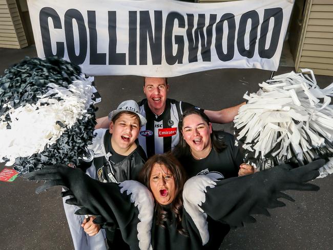 Fanatic Collingwood supporter cheer squad, dressed head to toe in black and white. Victoria Park. L to R Damion Lumani, Paul Clarke, Voula Bitsikas and Trish Saladrigas. Picture: Tim Carrafa