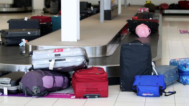 ADELAIDE, AUSTRALIA - NewsWire Photos July 28: Passengers of the last morning flight from Melbourne arrive at Adelaide Airport. South Australia will be closing its boarders to all travellers from Midnight tonight. Picture: NCA NewsWire / Kelly Barnes