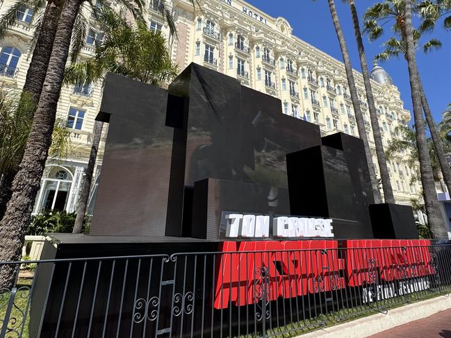 Screens are set up outside The Carlton hotel, showing clips from Mission: Impossible. Picture: Supplied/Bronte Coy