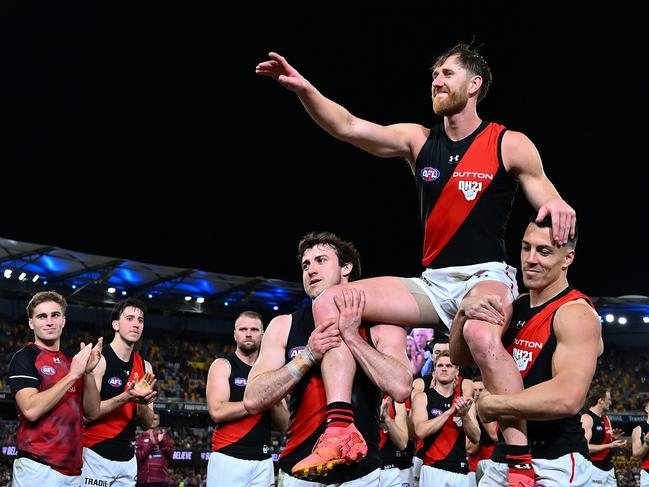 Dyson Heppell waves goodbye to AFL footy.