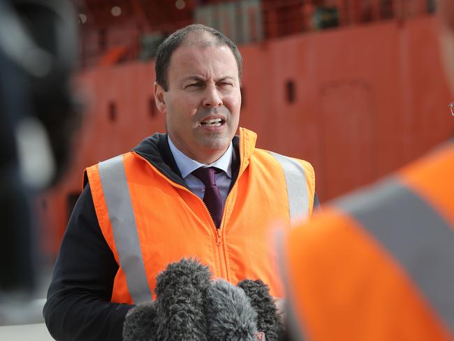 Environment Minister Josh Frydenberg speaks in front of the Aurora Australis, docked in Hobart before departing to Antarctica Picture: Luke Bowden