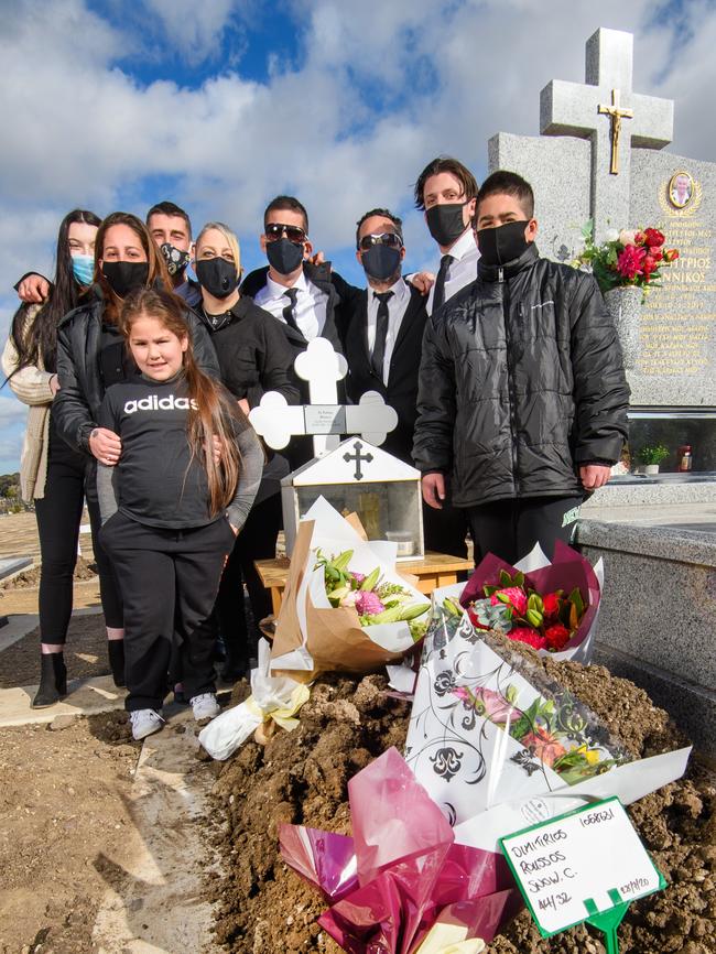 Dimitrios Roussos’ family at his grave. Picture: Jay Town