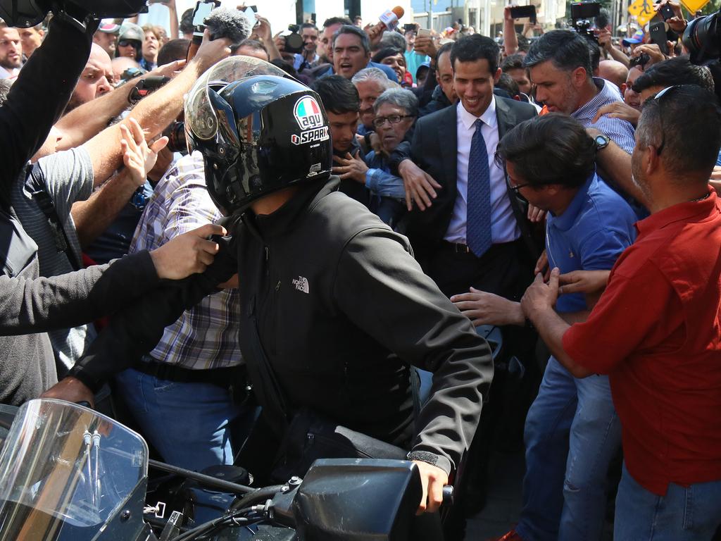 Juan Guaida, who has appointed himself interim president, arrives to a meeting with deputies, media and supporters organised by the National Assembly at Plaza Bolivar of Chacao on in Caracas, Venezuela. Picture: Getty