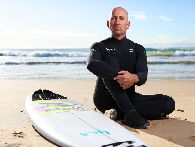 WEEKEND TELEGRAPH. WEEKEND MAG COVER SHOOT. JULY 17, 2024.Pictured at Manly Beach today is blind surfer Matt Formston. The Four time para surfing World Champion, former Paralympic Cyclist and World Champion has taken his quest for sporting greatness to new heights, setting a new Guinness World Record for the largest wave surfed by a vision impaired male (IS2), captured in the new feature-length documentary, ÃThe Blind SeaÃ. Picture: Tim Hunter.