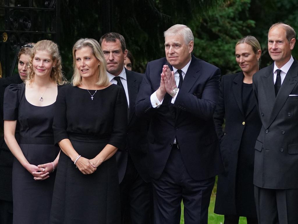 Princess Beatrice of York (L), Britain's Lady Louise Windsor (2L), Britain's Sophie, Countess of Wessex (3L), Peter Phillips (4L), Britain's Princess Eugenie of York (obscured), Prince Andrew, Duke of York (C), Zara Phillips (2R) and Britain's Prince Edward, Earl of Wessex greet members of the public gathered outside Balmoral Castle in Ballater, on September 10. Picture: Owen Humphreys / AFP