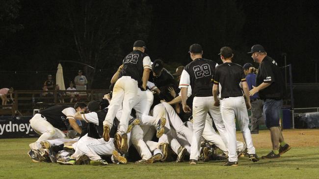 Penrith Baseball Club celebrate after winning the State League Title. Photo: Mellannie Harris.