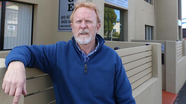 Stephen Heraghty (corr.sp.) of Lauderdale has recently bought into Tasmania's real estate market as the Sydney market is over-heated. He is pictured in front of his Hobart Lodge - 395-401 Elizabeth Street, North Hobart.