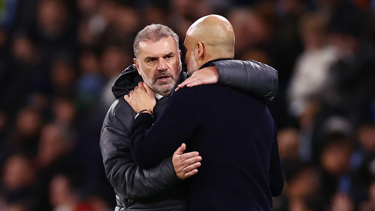 Ange Postecoglou hugs mentor Pep Guardiola. Photo by Naomi Baker/Getty Images.