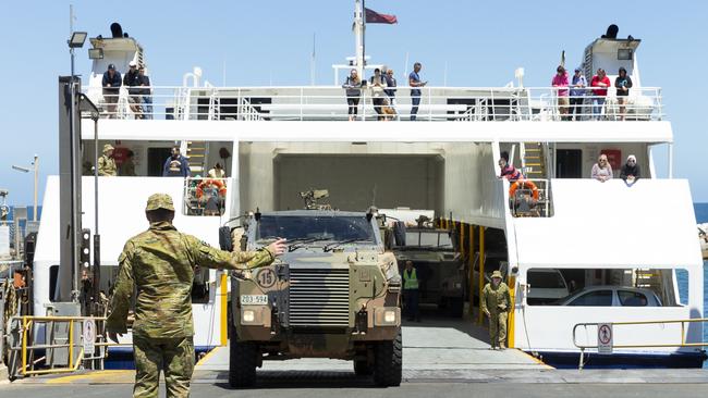 Reservists from the 10th/27th Battalion, Royal South Australia Regiment, load vehicles onto the Kangaroo Island ferry at Cape Jervis, SA, during OP Bushfire Assist. Picture: Australian Defence Force