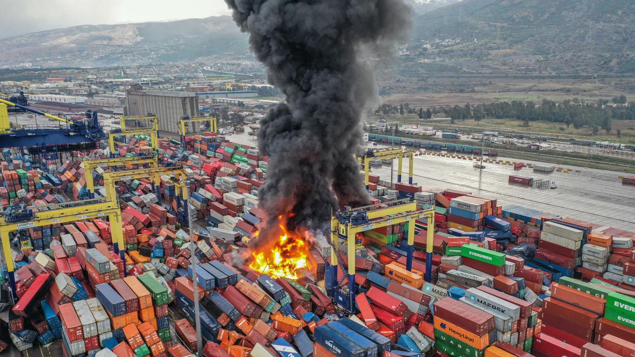 HATAY, TURKIYE - FEBRUARY 06: An aerial view of the fire in overturned containers during the earthquakes in Hatay, Turkiye after 7.7 and 7.6 magnitude earthquakes hits Turkiye's Kahramanmaras, on February 06, 2023. Disaster and Emergency Management Authority (AFAD) of Turkiye said the 7.7 magnitude quake struck at 4.17 a.m. (0117GMT) and was centered in the Pazarcik district and 7.6 magnitude quake struck in Elbistan district in the province of Kahramanmaras in the south of Turkiye. Gaziantep, Sanliurfa, Diyarbakir, Adana, Adiyaman, Malatya, Osmaniye, Hatay, and Kilis provinces are heavily affected by the earthquakes. (Photo by Murat Sengul/Anadolu Agency via Getty Images)