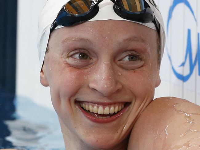 United States' Katie Ledecky smiles after setting a new World Record in a women's 1500m freestyle heat at the Swimming World Championships in Kazan, Russia, Monday, Aug. 3, 2015. (AP Photo/Sergei Grits)